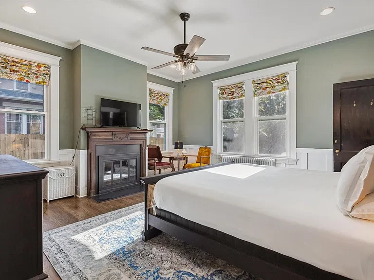 King bedroom with fireplace at McLean Manor